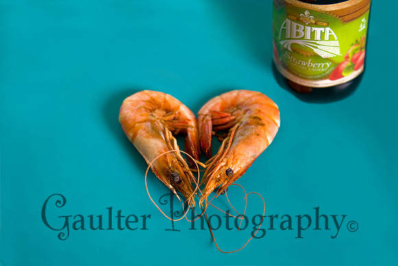 Two shrimp formed into the shape of a heart